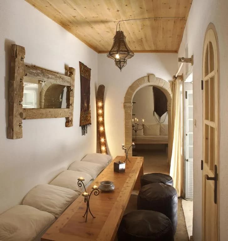 Coin salon cosy du Riad Baladin à Essaouira — décor marocain chaleureux