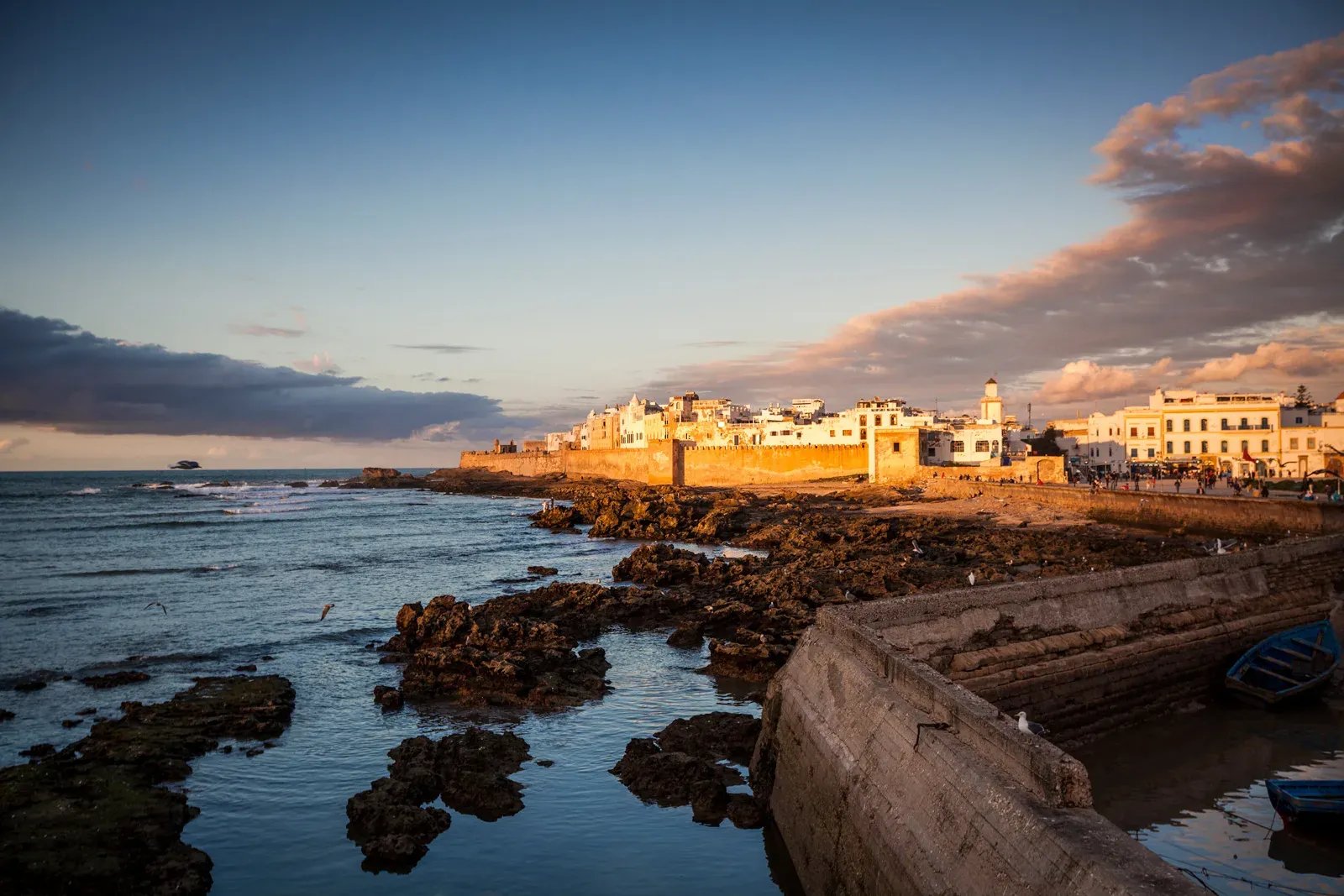 Essaouira port and medina — blue fishing boats and ramparts, steps from the kitesurf holiday accommodation