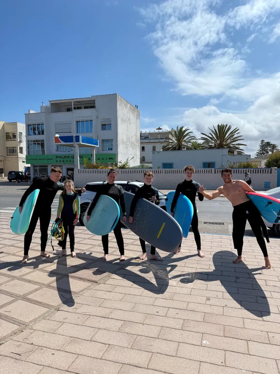 Group of Windy Essaouira surfers with their boards on the Essaouira seafront