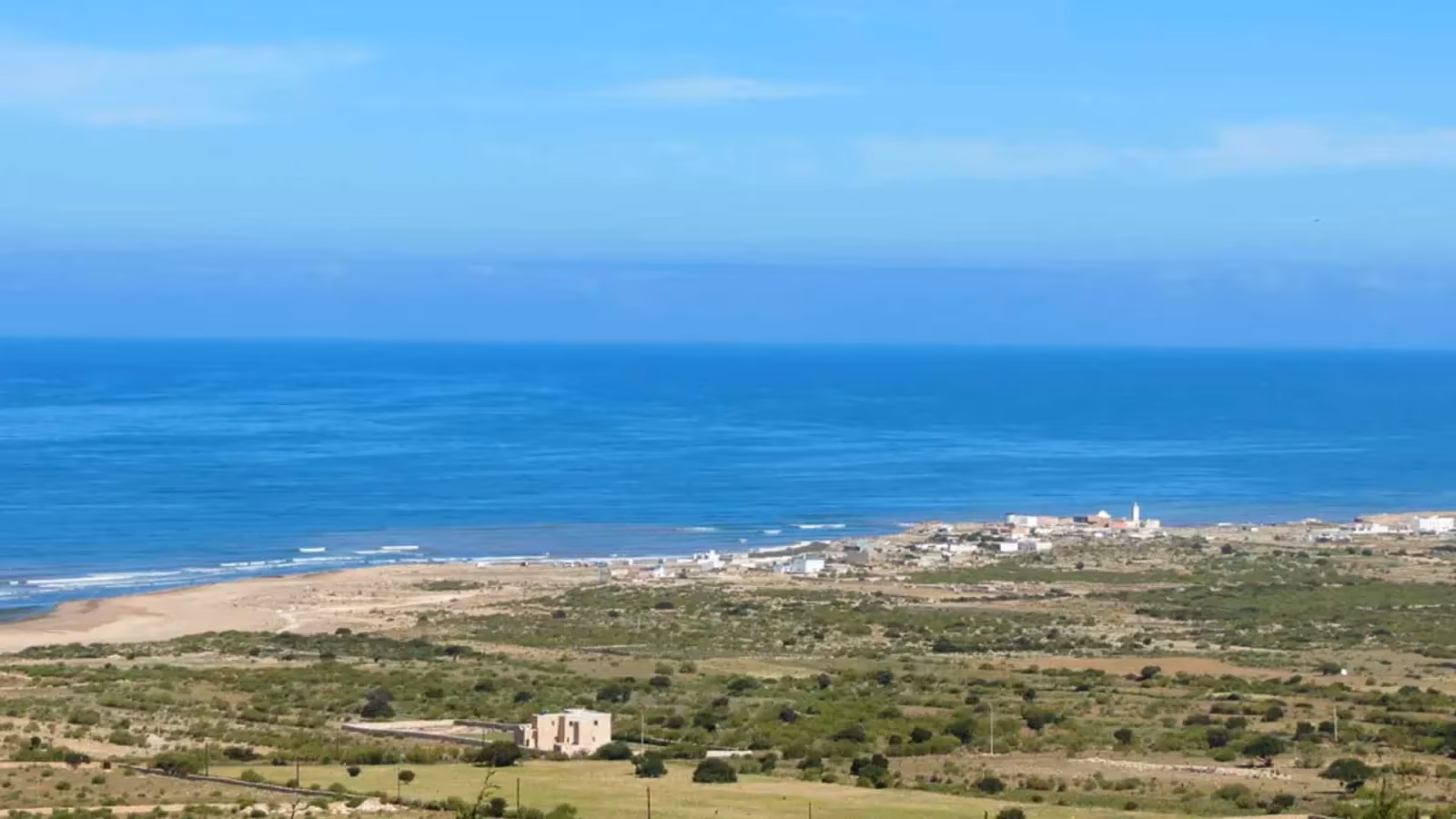 Atlantic coast of Moulay Bouzerktoun near Essaouira — kitesurf downwind spot, village and ocean